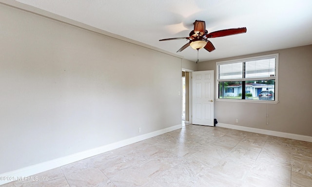 5110 Janice Cir E, Jacksonville, FL 32210 - spare room featuring a ceiling fan and baseboards