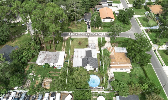 5110 Janice Cir E, Jacksonville, FL 32210 - aerial view of property's location with property parcel outlined and nearby suburban area
