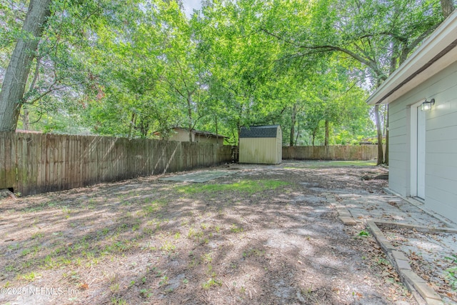 3349 Gilmore St, Jacksonville, FL 32205 - fenced backyard featuring a shed