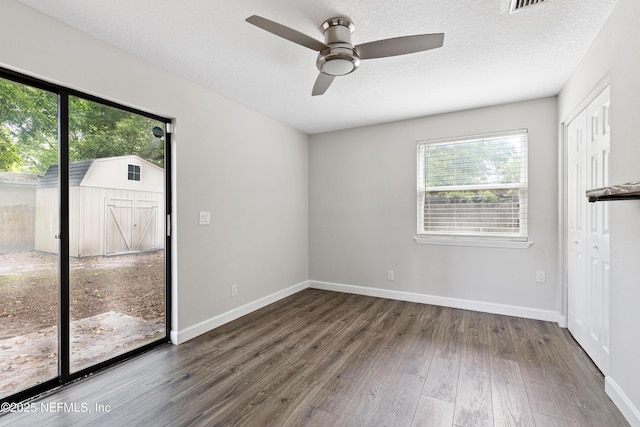 3349 Gilmore St, Jacksonville, FL 32205 - unfurnished room featuring plenty of natural light, wood finished floors, and a ceiling fan