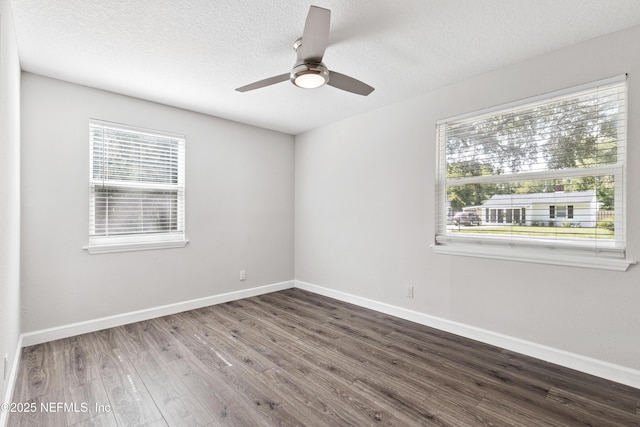 3349 Gilmore St, Jacksonville, FL 32205 - unfurnished room featuring wood finished floors, ceiling fan, and a textured ceiling