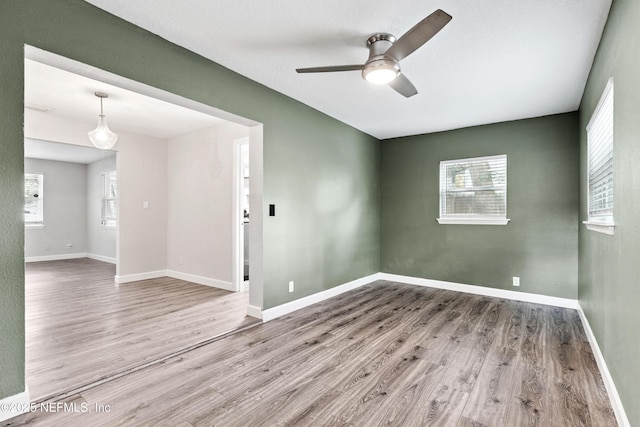 3349 Gilmore St, Jacksonville, FL 32205 - unfurnished room with wood finished floors and a ceiling fan