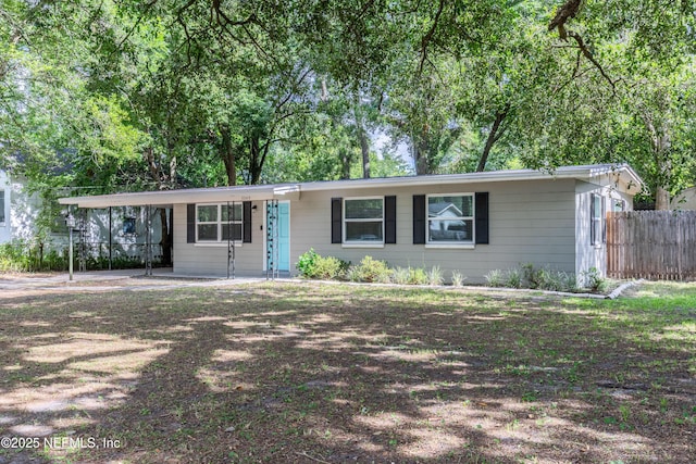 3349 Gilmore St, Jacksonville, FL 32205 - ranch-style house with an attached carport