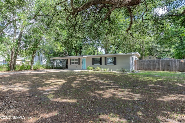 3349 Gilmore St, Jacksonville, FL 32205 - ranch-style house featuring an attached carport