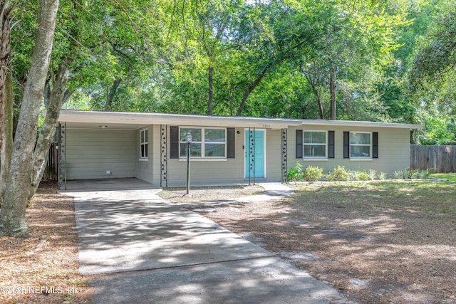 3349 Gilmore St, Jacksonville, FL 32205 - ranch-style home featuring driveway and a carport