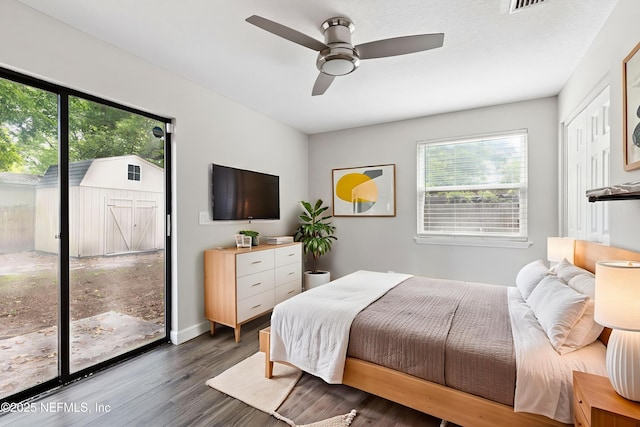 3349 Gilmore St, Jacksonville, FL 32205 - bedroom featuring multiple windows, wood finished floors, a ceiling fan, and access to outside
