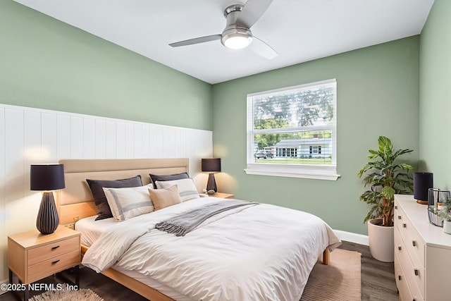 3349 Gilmore St, Jacksonville, FL 32205 - bedroom with wood finished floors, wainscoting, and ceiling fan