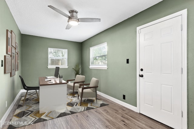 3349 Gilmore St, Jacksonville, FL 32205 - office area with a ceiling fan and wood finished floors