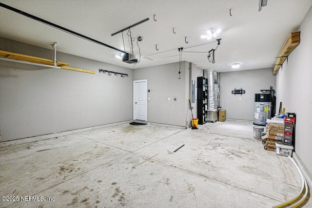 1103 Orchard Oriole Pl, Middleburg, FL 32068 - garage with a garage door opener and water heater