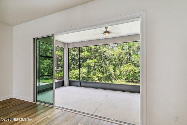 1103 Orchard Oriole Pl, Middleburg, FL 32068 - unfurnished room with plenty of natural light and wood finished floors