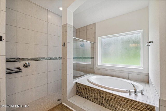 1103 Orchard Oriole Pl, Middleburg, FL 32068 - bathroom featuring a garden tub and tiled shower