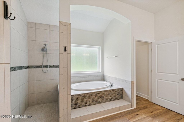 1103 Orchard Oriole Pl, Middleburg, FL 32068 - full bath with a bath, a tile shower, and wood finished floors