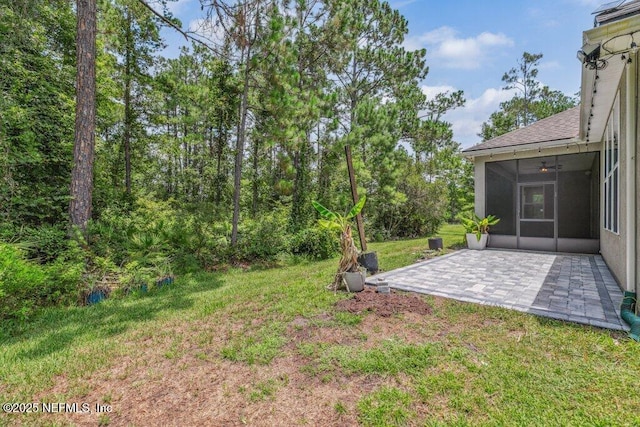 1103 Orchard Oriole Pl, Middleburg, FL 32068 - view of green lawn featuring a sunroom and a patio