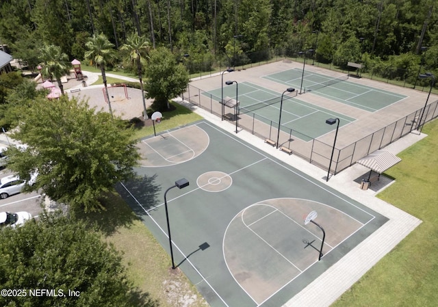 1103 Orchard Oriole Pl, Middleburg, FL 32068 - view of sport court featuring community basketball court and a wooded view