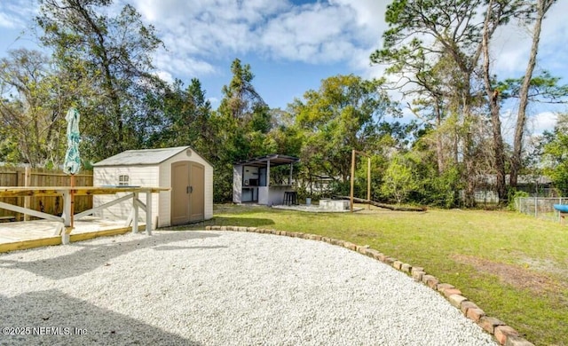 1922 Locust Ave, Palatka, FL 32177 - view of yard featuring a storage shed and a patio area