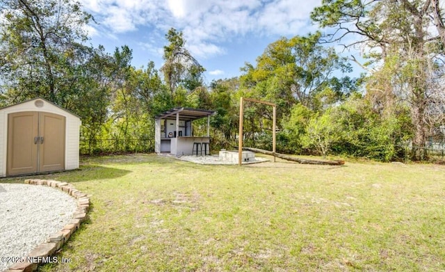 1922 Locust Ave, Palatka, FL 32177 - view of yard with a storage shed and view of scattered trees
