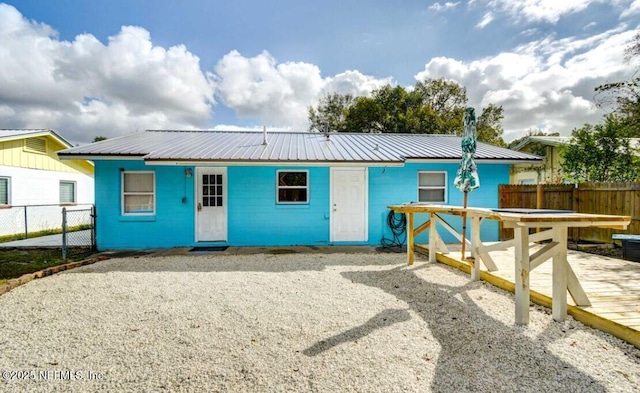 1922 Locust Ave, Palatka, FL 32177 - rear view of house featuring a metal roof