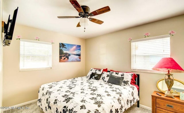1922 Locust Ave, Palatka, FL 32177 - carpeted bedroom featuring baseboards and ceiling fan