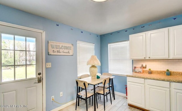 1922 Locust Ave, Palatka, FL 32177 - dining space with healthy amount of natural light and light wood-type flooring