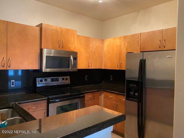 8290 Gate Pkwy W Unit 1009, Jacksonville, FL 32216 - photo 3