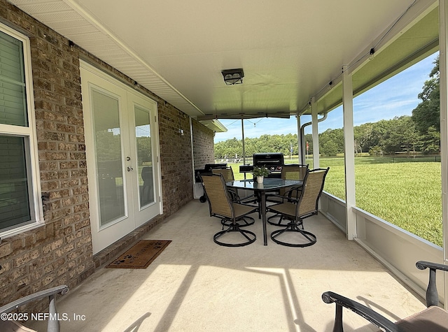 51321 Bloomington Way, Callahan, FL 32011 - sunroom featuring outdoor dining space, plenty of natural light, and french doors