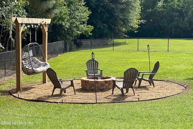 51321 Bloomington Way, Callahan, FL 32011 - view of yard featuring an outdoor fire pit