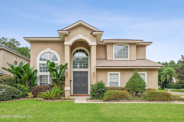 1020 Candlebark Dr, Jacksonville, FL 32225 - view of front of home featuring stucco siding and a front yard