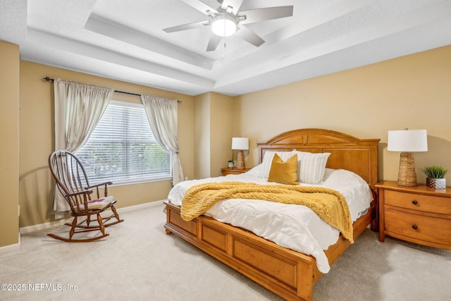 1020 Candlebark Dr, Jacksonville, FL 32225 - bedroom featuring a tray ceiling, light colored carpet, and ceiling fan