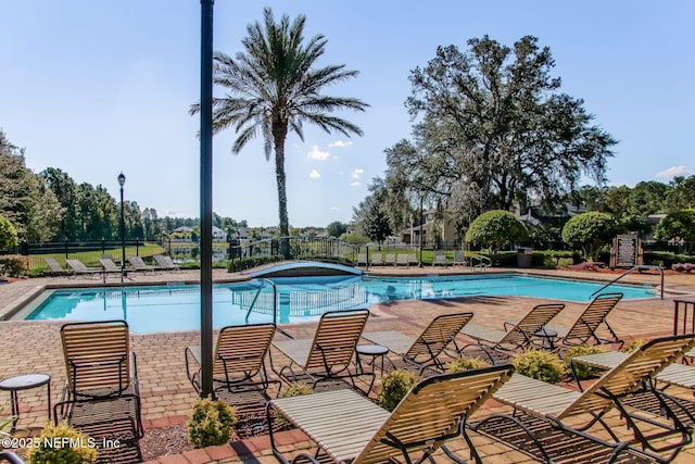 1020 Candlebark Dr, Jacksonville, FL 32225 - community pool with a patio