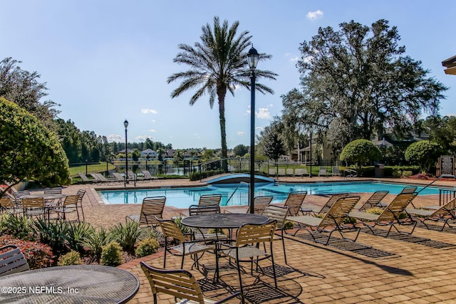 1020 Candlebark Dr, Jacksonville, FL 32225 - community pool with a patio area