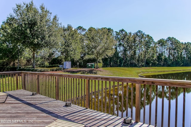 1020 Candlebark Dr, Jacksonville, FL 32225 - wooden deck with a water view, a yard, and view of scattered trees