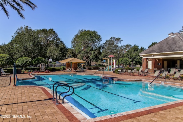1020 Candlebark Dr, Jacksonville, FL 32225 - community pool featuring a patio area