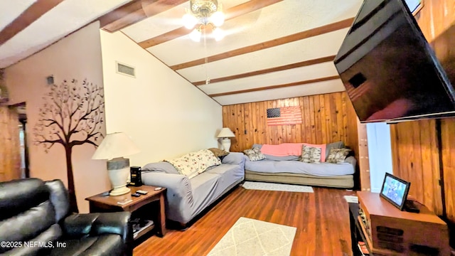3822 County Road 220, Middleburg, FL 32068 - living room featuring wooden walls, wood finished floors, and ceiling fan
