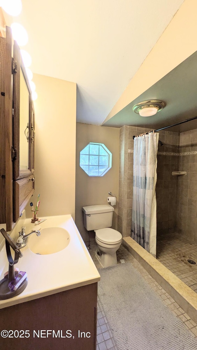 3822 County Road 220, Middleburg, FL 32068 - bathroom featuring tile patterned floors, vanity, and tiled shower