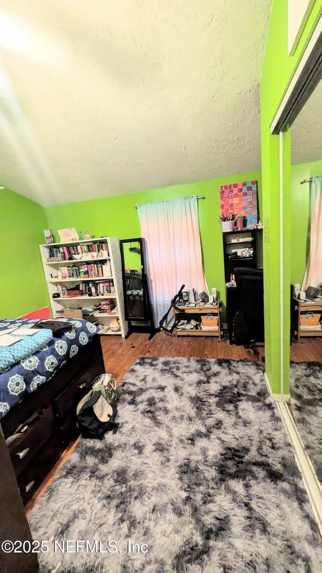 3822 County Road 220, Middleburg, FL 32068 - bedroom featuring wood finished floors