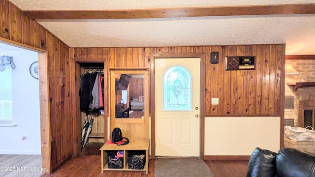 3822 County Road 220, Middleburg, FL 32068 - entrance foyer featuring wood finished floors, wooden walls, and beam ceiling