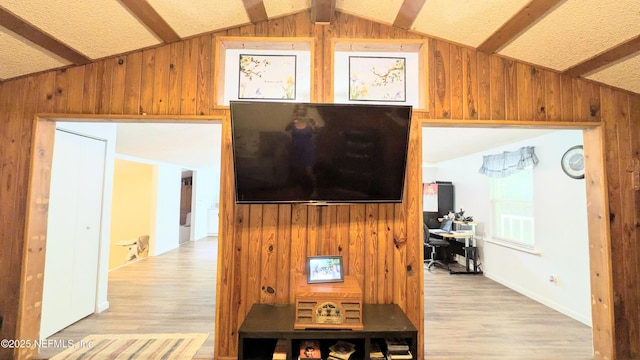 3822 County Road 220, Middleburg, FL 32068 - living room with wooden walls and light wood-style floors