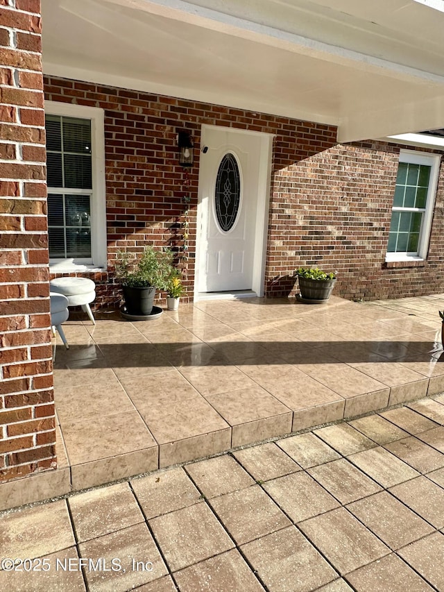 8300 Berry, Jacksonville, FL 32211 - property entrance featuring brick siding