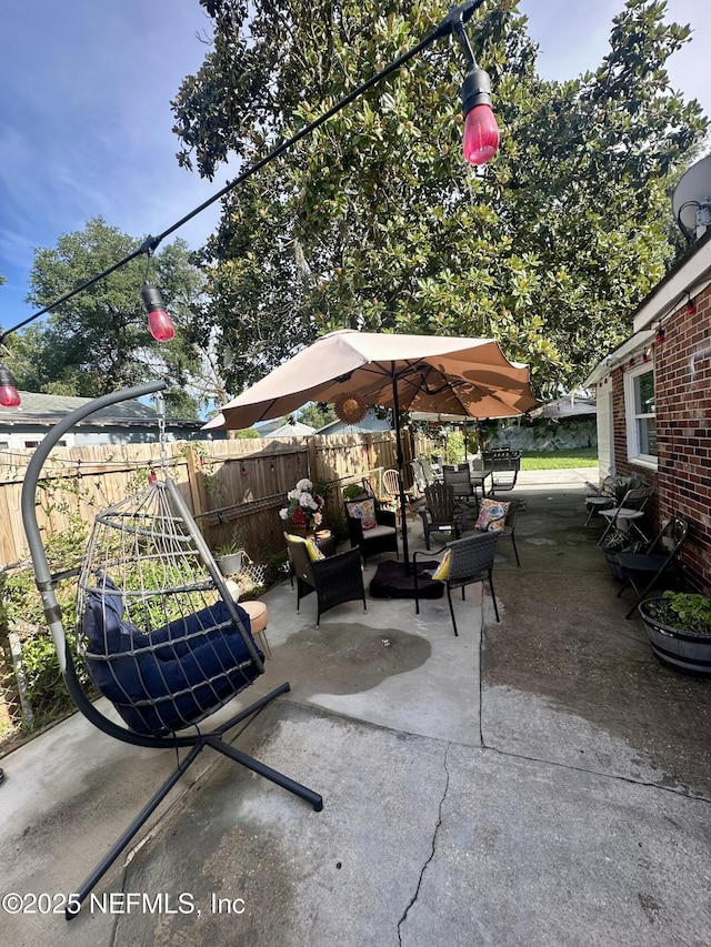8300 Berry, Jacksonville, FL 32211 - view of patio featuring an outdoor hangout area