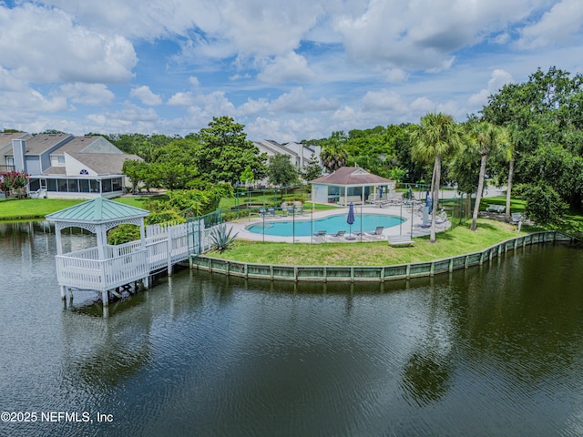 335 Sunrise Cir, Neptune Beach, FL 32266 - dock area with a community pool, a gazebo, a water view, and a patio area