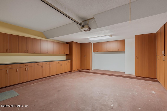 335 Sunrise Cir, Neptune Beach, FL 32266 - garage featuring a garage door opener