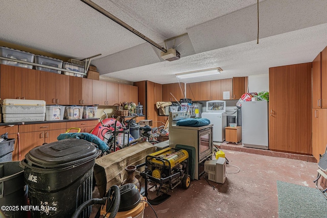 335 Sunrise Cir, Neptune Beach, FL 32266 - garage with a garage door opener, fridge, and washer and dryer