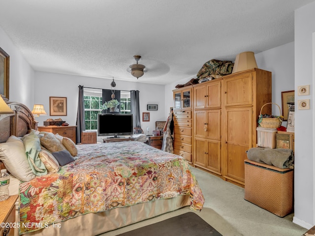 335 Sunrise Cir, Neptune Beach, FL 32266 - bedroom with light colored carpet, a textured ceiling, and ceiling fan
