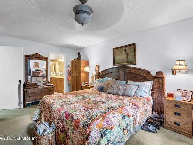 335 Sunrise Cir, Neptune Beach, FL 32266 - bedroom with carpet floors, a textured ceiling, and ensuite bathroom