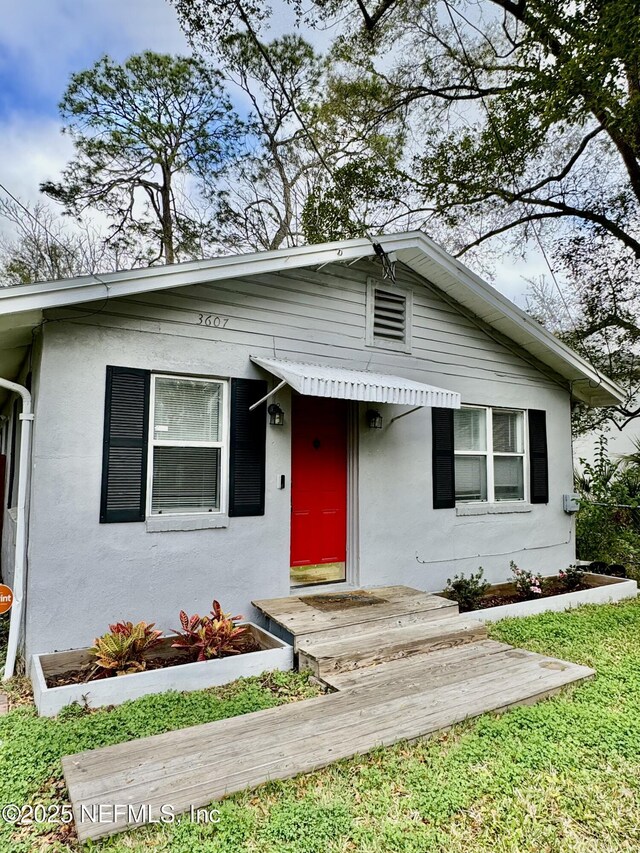3607 Gilmore St, Jacksonville, FL 32205 - bungalow-style house with stucco siding