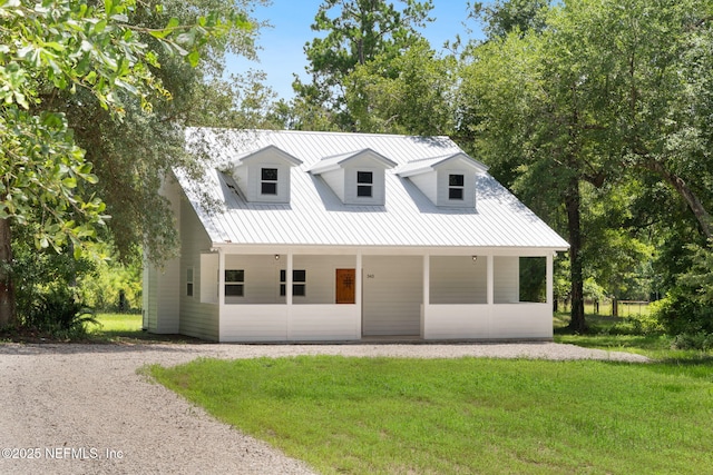 343 Tinsley Rd, Florahome, FL 32140 - view of front of property with a front yard and a metal roof