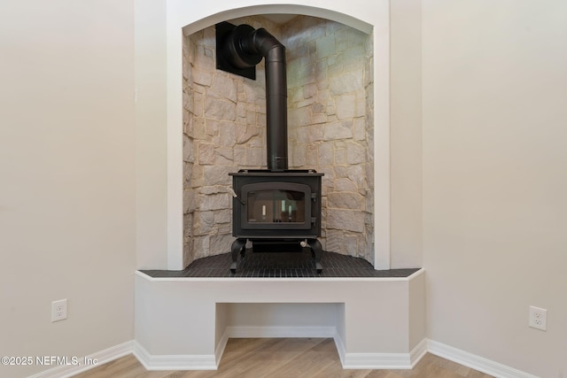 343 Tinsley Rd, Florahome, FL 32140 - detailed view of a wood stove and wood finished floors