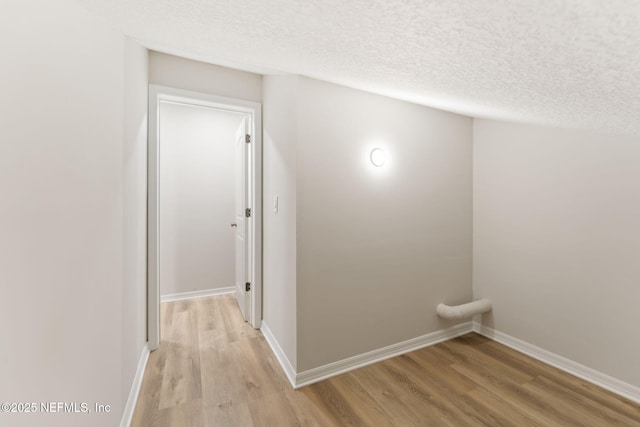 343 Tinsley Rd, Florahome, FL 32140 - hallway featuring light wood-style flooring and a textured ceiling