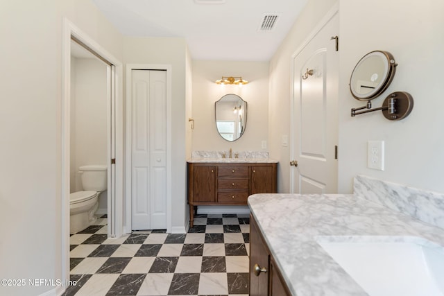 343 Tinsley Rd, Florahome, FL 32140 - bathroom with a closet and two vanities