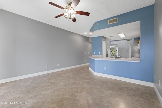 4000 Grande Vista Blvd Unit 15-106, Saint Augustine, FL 32084 - unfurnished room with a ceiling fan, a textured ceiling, and vaulted ceiling